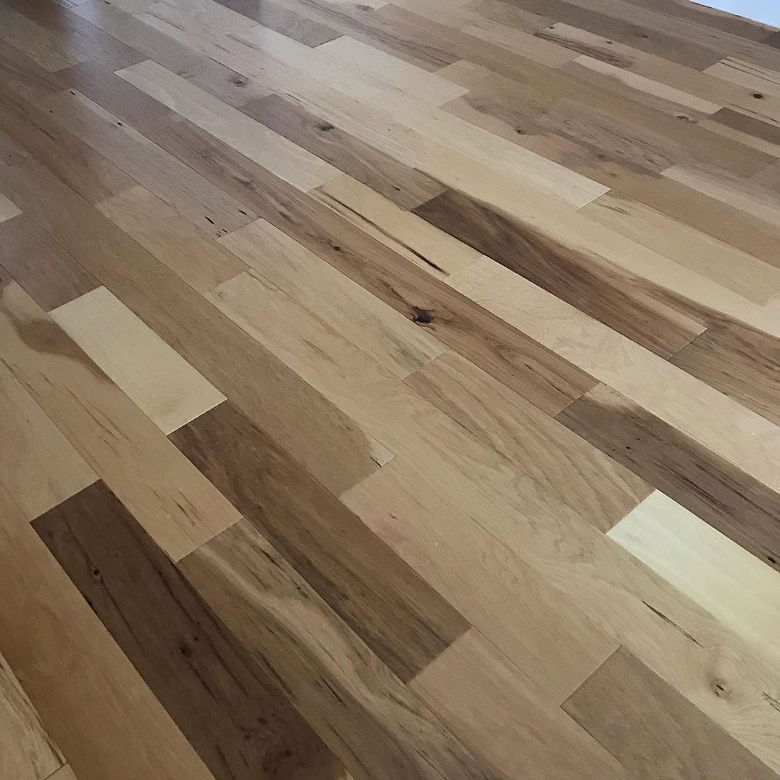 Close-up of mixed-width hardwood planks